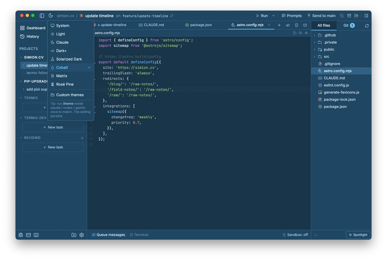Termic's theme switcher open over the editor, listing System, Light, Claude, Dark+, Solarized Dark, Cobalt, Matrix and Rosé Pine plus a Custom themes entry, with Cobalt selected so the whole app (sidebar, tabs and editor) is rendered in the blue Cobalt palette.